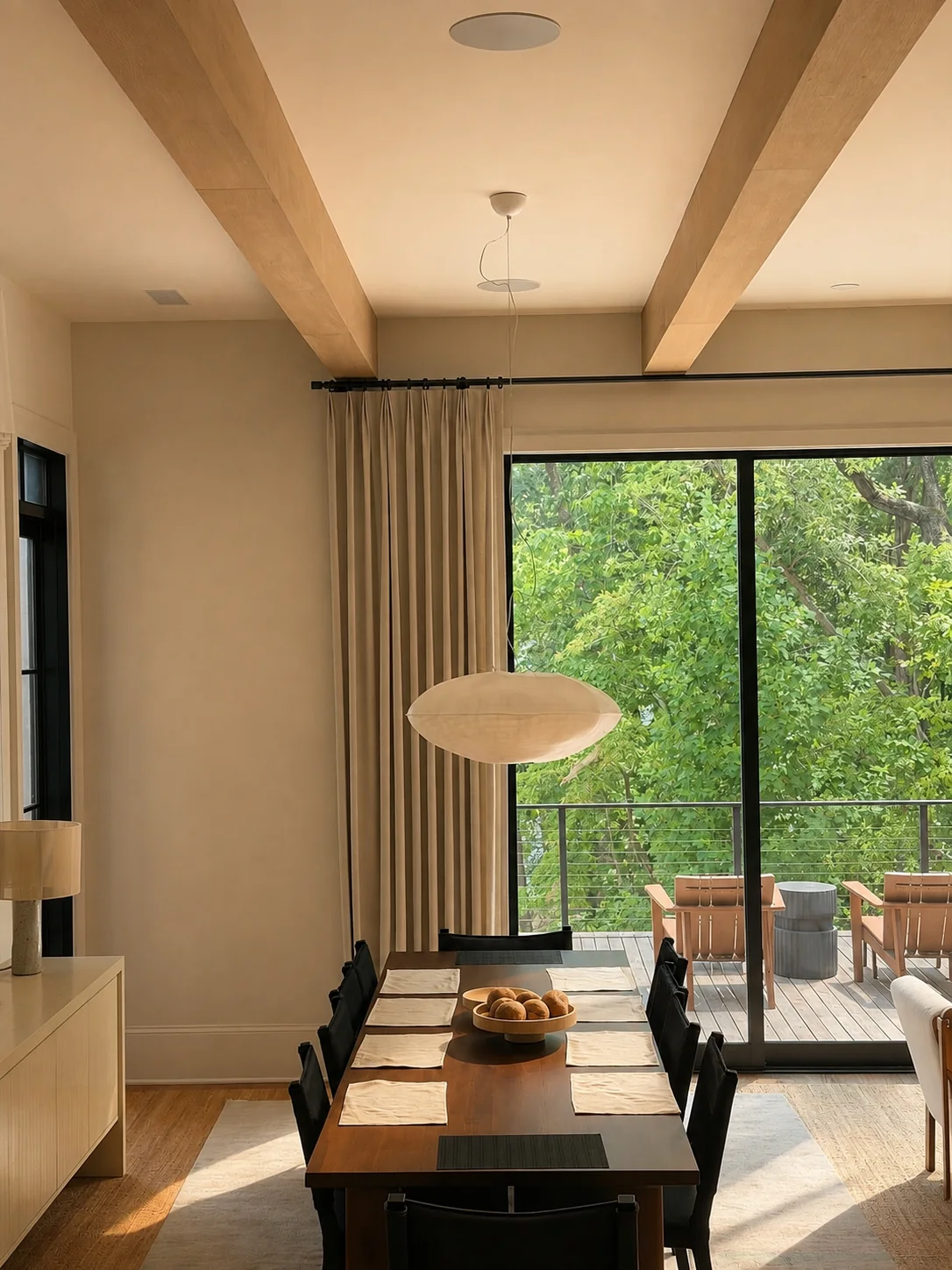 Breeze Bay dining area with integrated ceiling speaker and view toward the lake