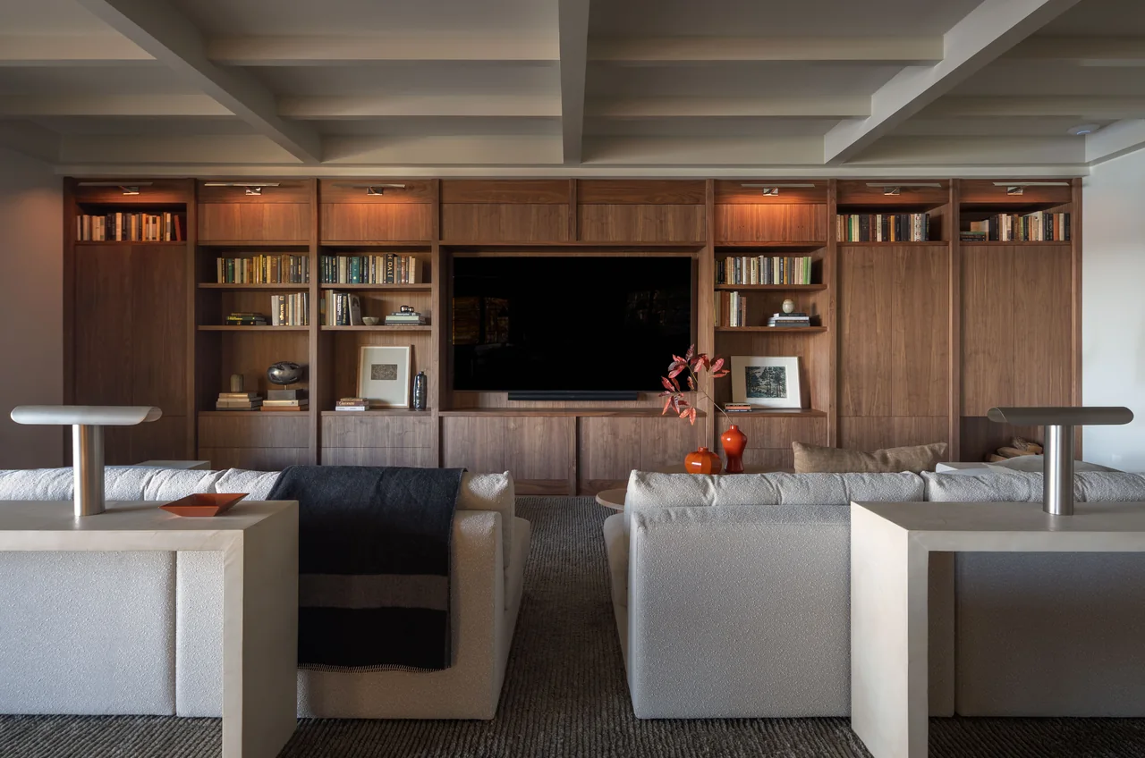 Breeze Bay media room with integrated television and custom millwork